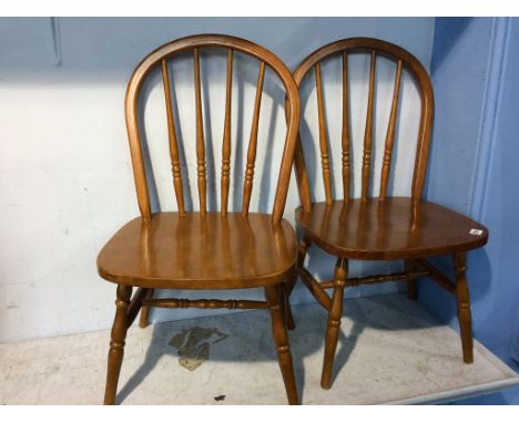 A pair of Children's stick back chairs