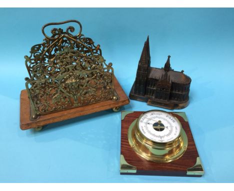 A modern barometer, pierced brass paper rack etc.
