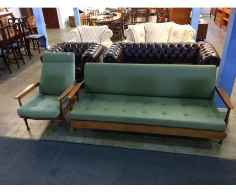 A Guy Rogers 'Manhattan' sofa bed and reclining armchair