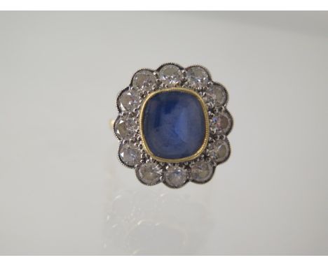 An 18ct yellow gold diamonds and sapphire cluster ring - head approx 16.5mm x 17.5mm - ring size L - approx weight 6.6 grams 