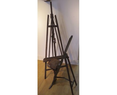 A folding artist easel by Lechertier Barbe &amp; Co, London - adjustable height, and an adjustable artist stool 