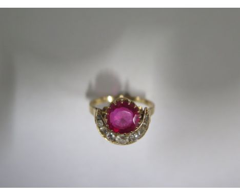 A yellow gold ruby or spinel and diamond crescent ring the centre stone approx 9mm x 4.5mm - tests to approx 18ct - ring size