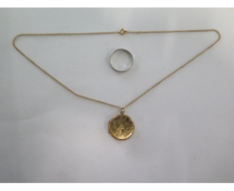 A 9ct yellow gold chain approx weight 1.5 grams, a plated locket and a platinum band ring size Q, approx weight 3 grams 