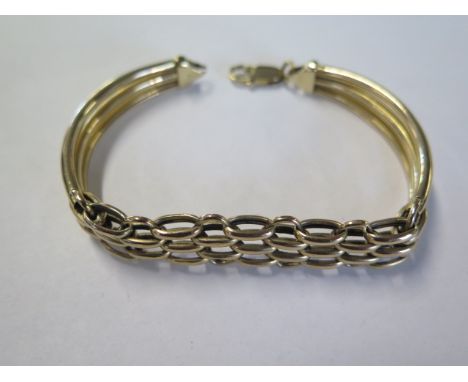 A 9ct yellow gold bracelet approx 17 grams - generally good, some wear to end ring 