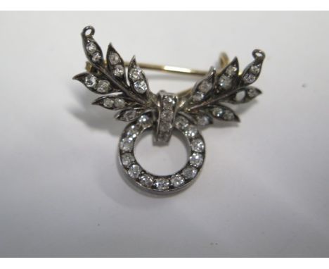 A gilt metal diamond foliate and drop ring pendant/brooch with screw off back - some bending, missing one diamond - approx we