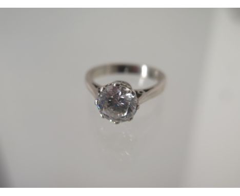 An 18ct white gold CZ ring - Diameter 8mm - ring size M - approx weight 5.3 grams 