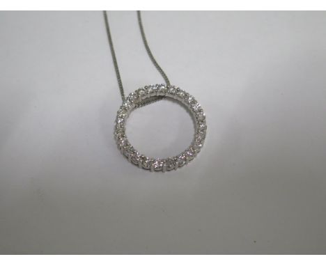 A 14ct white gold diamond circle pendant - Diameter 3cm - on a 9ct white gold 40cm chain - approx total weight 9.6 grams - in