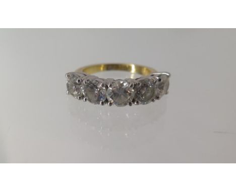 An 18ct yellow gold five stone diamond ring, each stone approx 0.70ct, approx 5.8mm x 3.6mm - ring size M -approx weight 6.9 