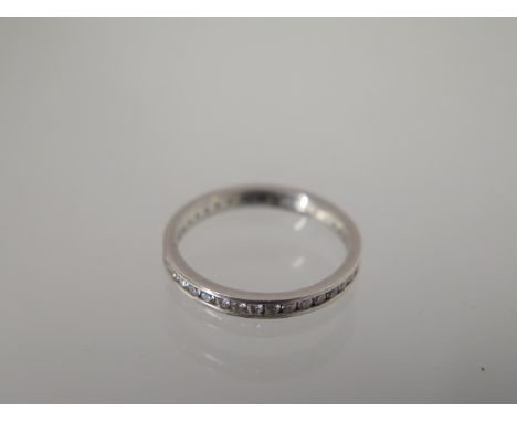 A platinum diamond eternity ring set with 38 stones assessed colour F/G, clarity VS1/VS2 - total approx weight 0.57ct - ring 