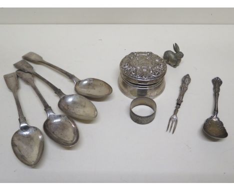 Four silver table spoons, a silver napkin ring, a sterling jam spoon, a pickle fork, two 900 silver rabbits and a silver trin