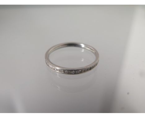 A 950 platinum diamond half eternity ring size O - approx weight 2.1 grams - some usage marks, diamonds bright 