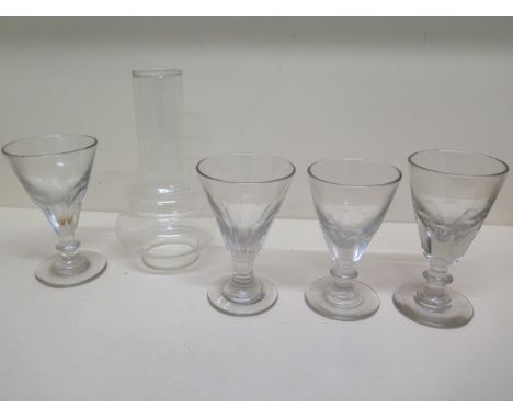 Four 19th century drinking glasses - tallest 15cm and an unusual oil lamp chimney 