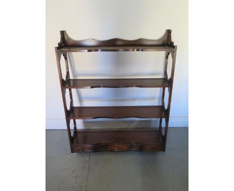 A mahogany Georgian style four tier wall shelf with three small drawers - Height 92cm x 69cm x 16cm 