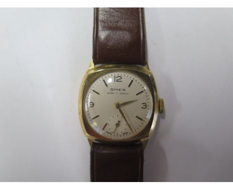 A 9ct yellow gold manual wind Omer wristwatch - 27mm case, in working order, total weight approx 21 grams 