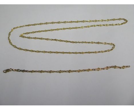 An 18ct yellow gold 80cm chain and a matching 21cm bracelet - approx weight 29 grams 