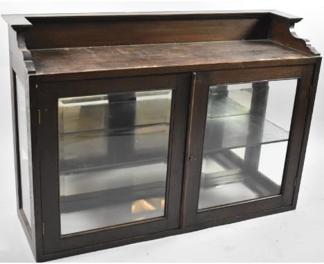 An Edwardian Glazed Oak Shop Counter Display Cabinet with Mirrored Back, Adjustable Mirrored Shelf and Galleried Top, 100cm W