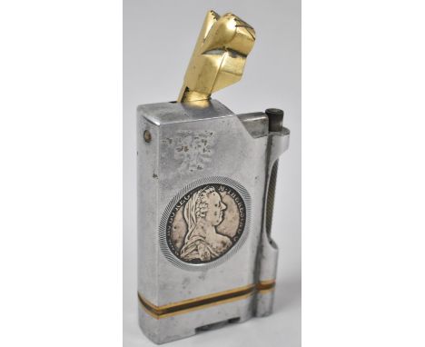 A Vintage Brass and White Metal Novelty Table Lighter, the Sides Inset with Two Marie Theresa Thalers by Canmiss, 11cm high 