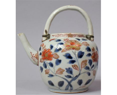 An 18th Century Imari Teapot with Loop Handle, Having Early Pewter Repair, No Lid, 15.5cm high 