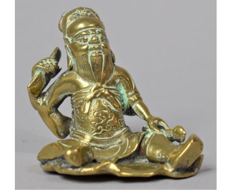 A Chinese Polished Bronze Figure of Seated Immortal, 5cm high 