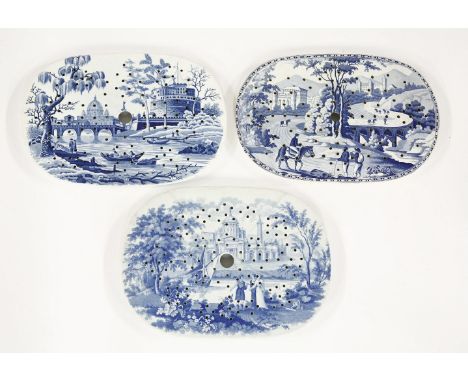 Three pottery Drainers,a Spode 'Tiber' pattern,a 'St. Peters, Rome', impressed, andanother with an Italian scene,32.5 to 33cm