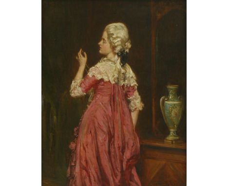 Talbot Hughes (1869-1942)'THE MINIATURE' - THREE-QUARTER LENGTH PORTRAIT OF A LADY IN A PINK DRESSSigned l.r., oil on panel26