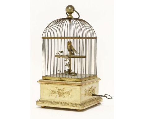A birdcage automaton,late 19th century, probably Bontems, the single singing bird in a square cage, the gilded base with appl