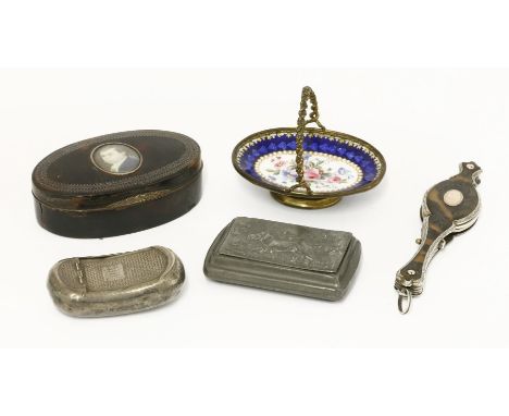A George III silver snuff box,by Cocks & Bettridge, Birmingham 1816,of curved oblong form, the cover decorated with scalework