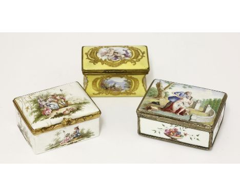 Three enamel boxes,19th/20th century, comprising:a waisted box with gilt reserved landscapes on a yellow ground,a rectangular