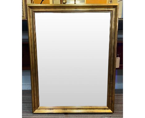 WALL MIRROR, gilt framed with a bevelled plate, 117cm x 92cm. 