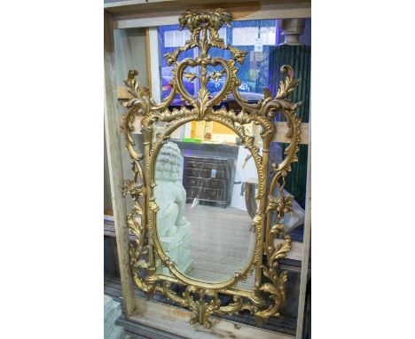 WALL MIRROR, 158cm H x 85cm, 18th century style giltwood with foliate carved frame. 