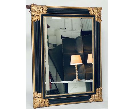 WALL MIRROR, Italian style ebonised and parcel gilt with bevelled mirror and bold acanthus spandrels, 122cm x 162cm H. 