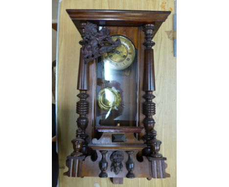 A 19th Century walnut Vienna wall clock 