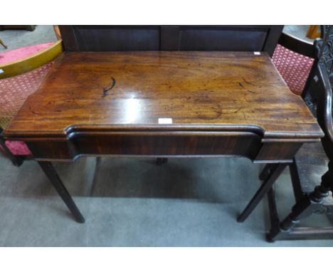 A George III mahogany rectangular fold over card table 