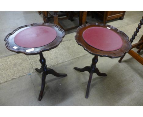 A pair of mahogany tripod wine tables 