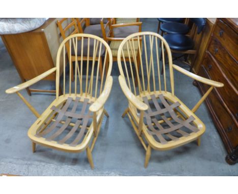 A pair of Ercol Blonde beech Windsor armchairs 