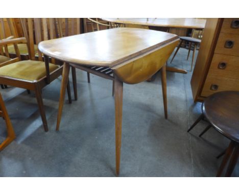 An Ercol Blonde elm and beech drop-leaf table 