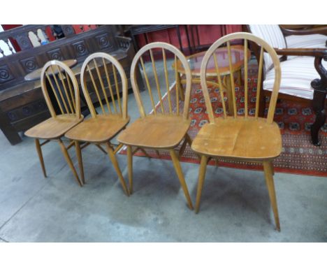 A set of four Ercol Blonde elm and beech Windsor chairs 