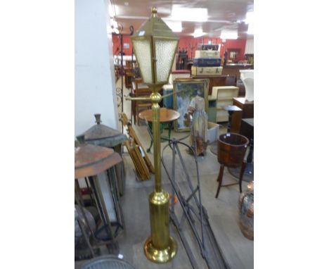A gilt metal free standing garden lantern 