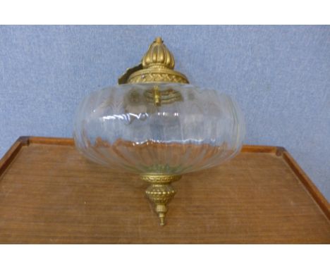 A gilt metal and glass hanging ceiling light 