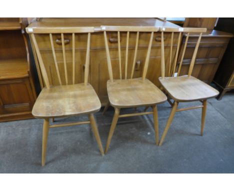 A set of three Ercol elm and beech 608 model chairs 