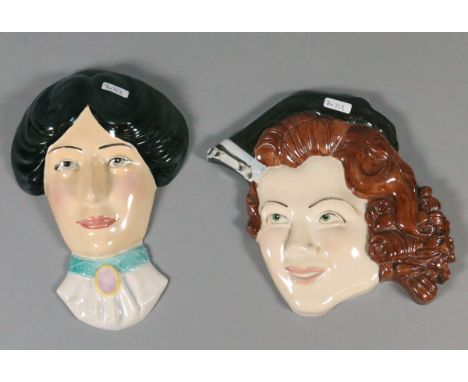 A pair of Art Deco style Limited Edition pottery face plaques to include Charlotte Rhead example.