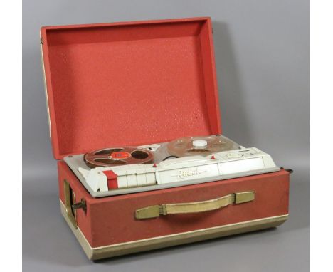 A cased Robuk tape recorder.