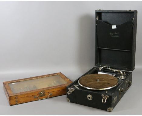 A distressed picnic gramophone along with a small table top display box and contents of carving tools.