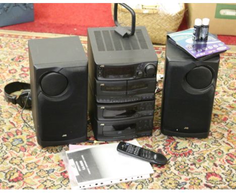 A JVC CA-5 500 stereo and speakers, remote and user manual.