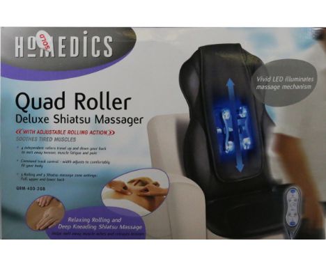 A boxed delux quad roller shiatsu massager.