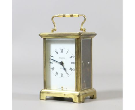 A brass cased eight day carriage clock with Roman numeral markers by Bayard, France.
