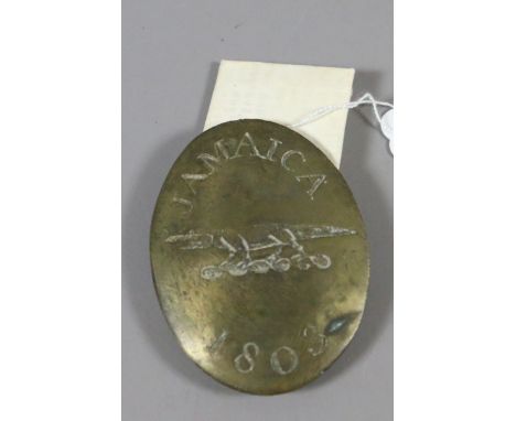 A Georgian Jamaican militia cloak clasp dated 1803 together with a typed letter of provenance.
