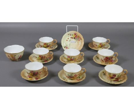 A Royal Worcester eighteen part tea service hand painted with flowers.