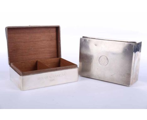 TWO SILVER CIGARETTE BOXES
one example maker Adie Brothers Ltd, Birmingham 1959, lid with engine turned design, presentation 
