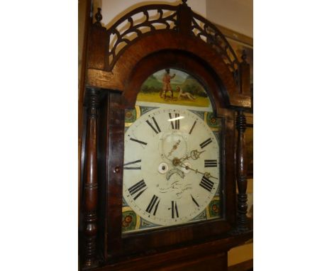 A 19th Century longcase clock by Johnson &amp; Sons, Darlington with 13" inch painted arched dial depicting flowers and a hun